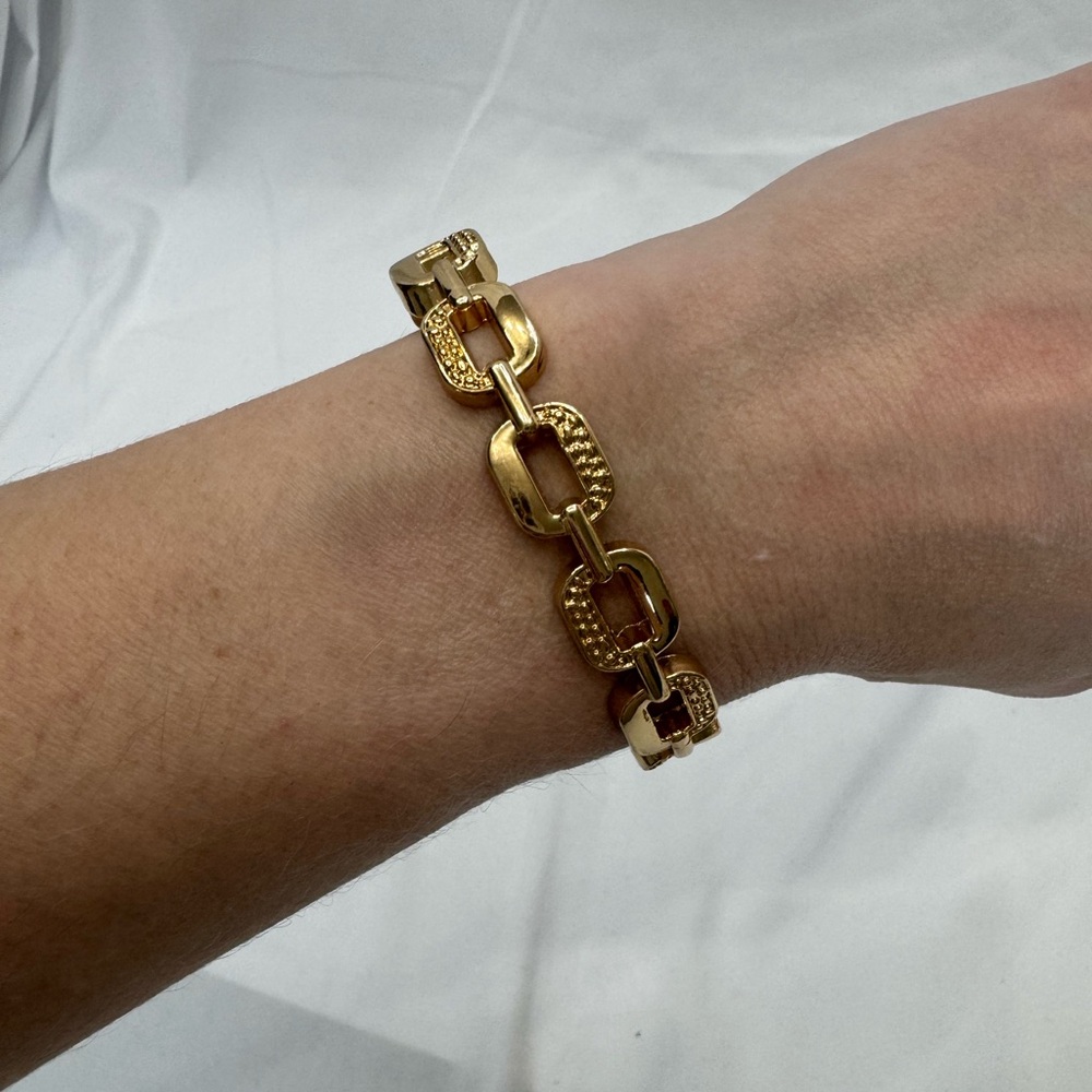 Gold tone bangle